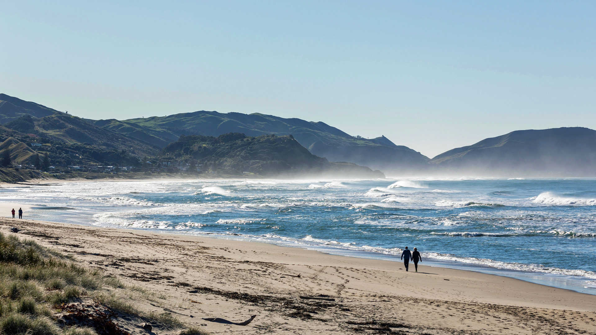 The beautiful shoreline at Wainui Beach
