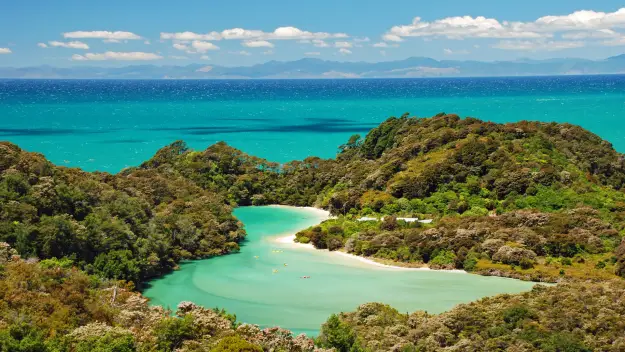 Abel Tasman National Park lagoon and kayakers